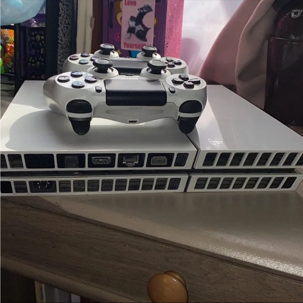 PS4 console with controllers